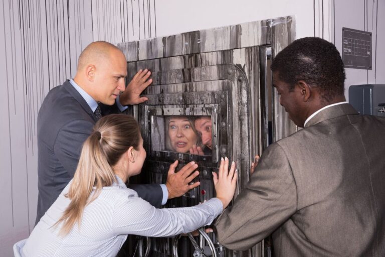 A group of people in suits trying to figure out how to get through to the other side.